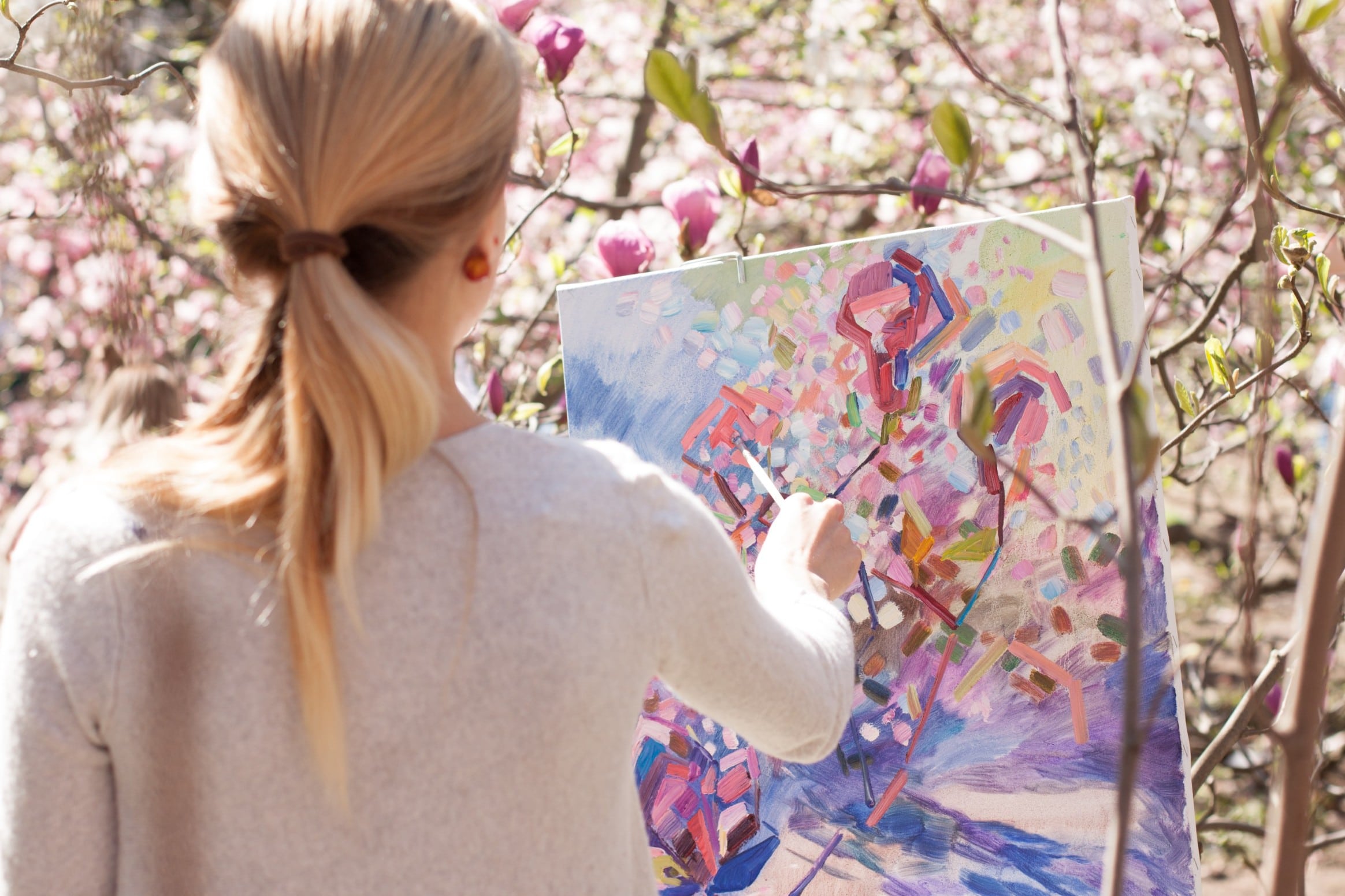 You can hire a freelance artist or designer to create art for you.